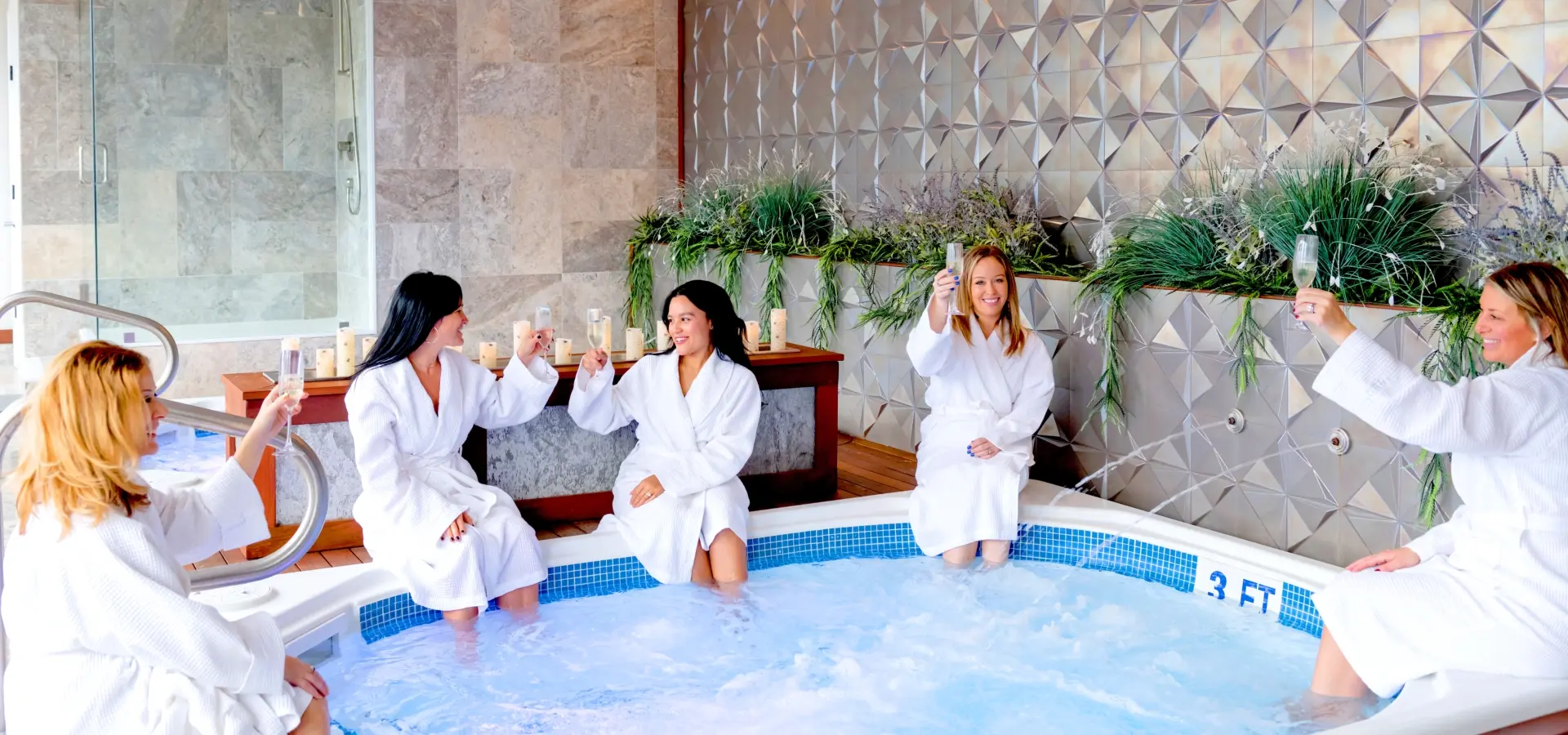 Women enjoying hydrotherapy at OH! Spa in The Preserve Sporting Club & Residences