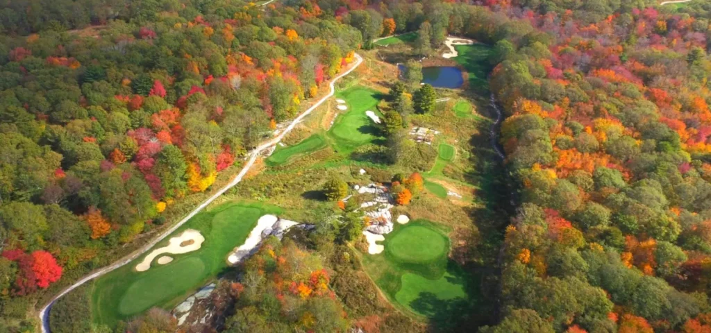 Aerial view of the golf course at The Preserve Sporting Club during fall.